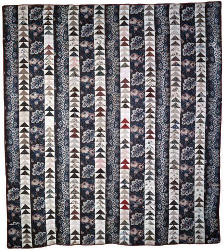 Quilt with Flying Geese pattern