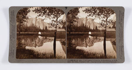 Mirror view of the majestic Cathedral Rocks—looking W.S.W. down the valley, Yosemite, Cal.