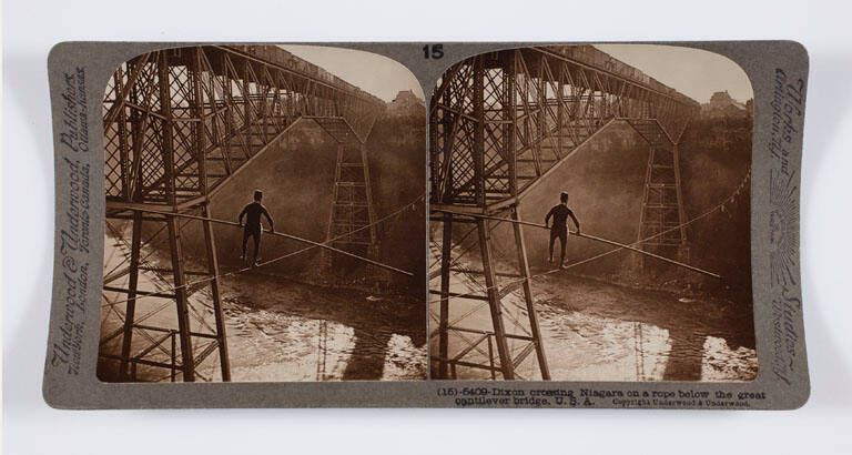 Dixon crossing Niagara on a rope below the great cantilever bridge, U.S.A.