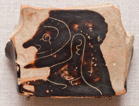Fragment from the rim of a krater, painted with a profile head