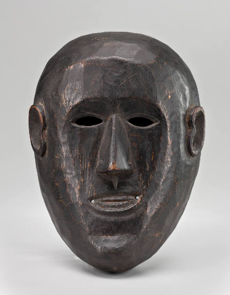 Mask of human face, mouth open, small, carved teeth