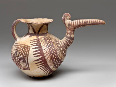 Spouted vessel with handle and painted decoration