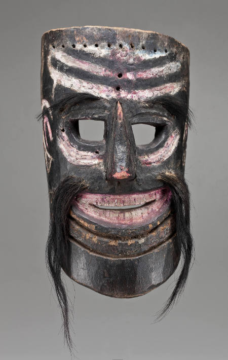 Mask with smiling mouth, red and white striped brow, and simple, pierced decoration