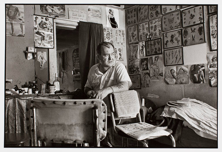 Bill Sanders in his tattoo shop, Washington Street, Houston