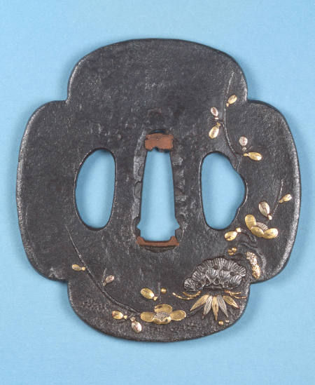 Four-Lobed Tsuba with design of plum, pine and bamboo.  (raised edges)