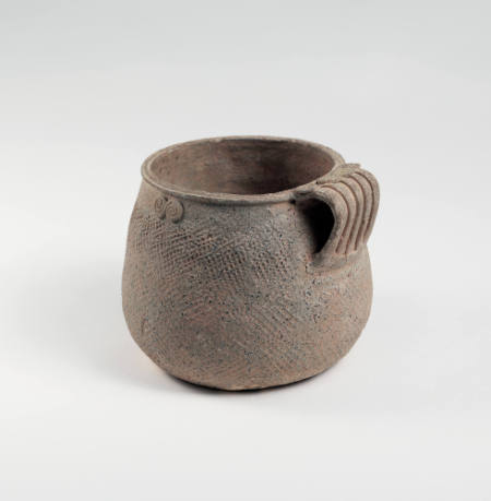 Cup with cloth-impressed pattern